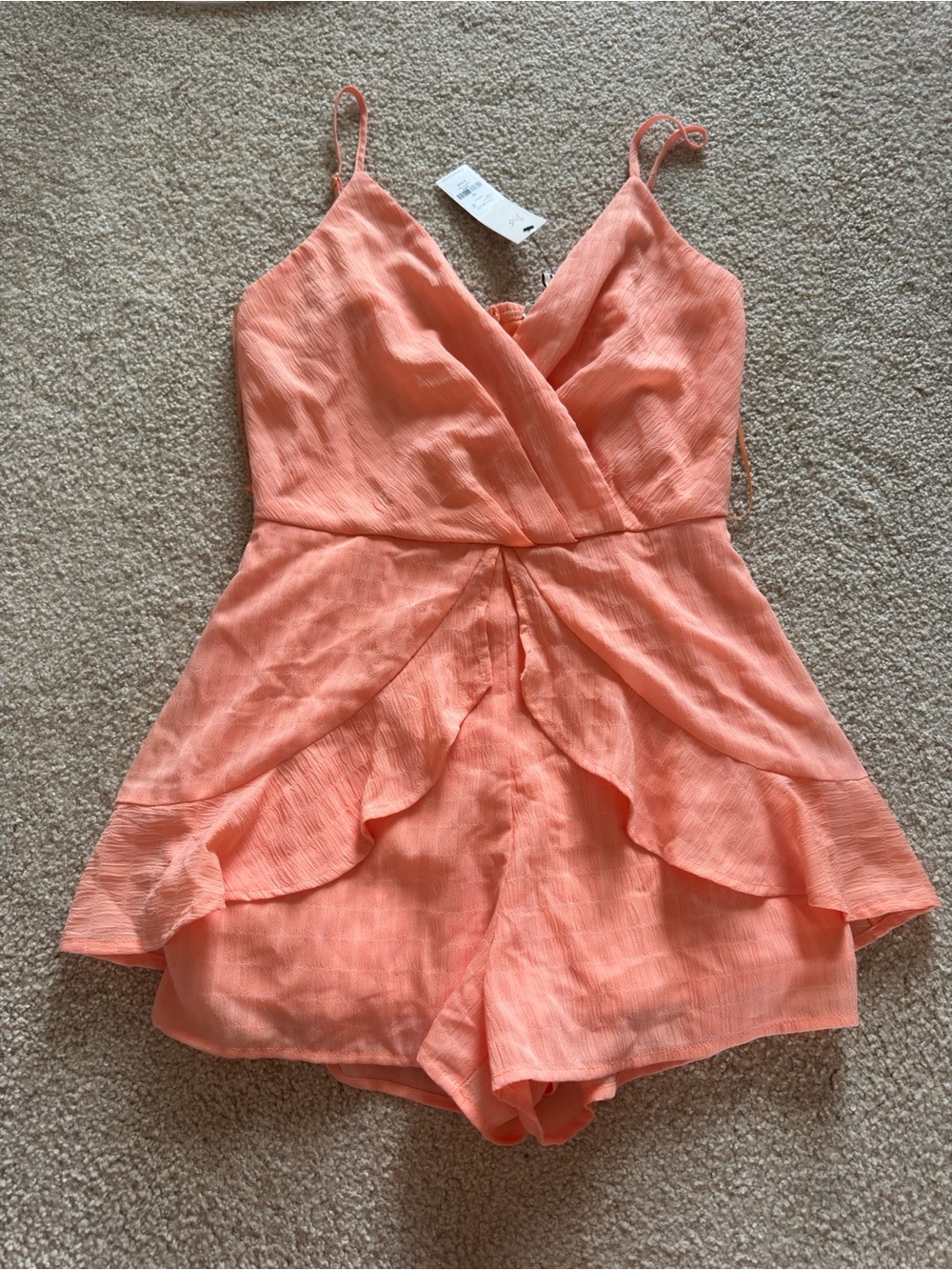 Francesca’s Coral Pink Ruffle One-Piece Romper